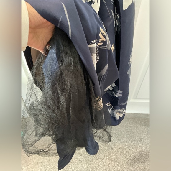 Elegant Navy Cross-Back Top with Floral Skirt - Picture 11 of 13